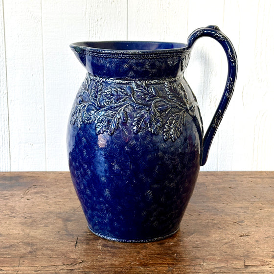 Large Cobalt Blue Glazed Pitcher with Oak Leaves and Acorns